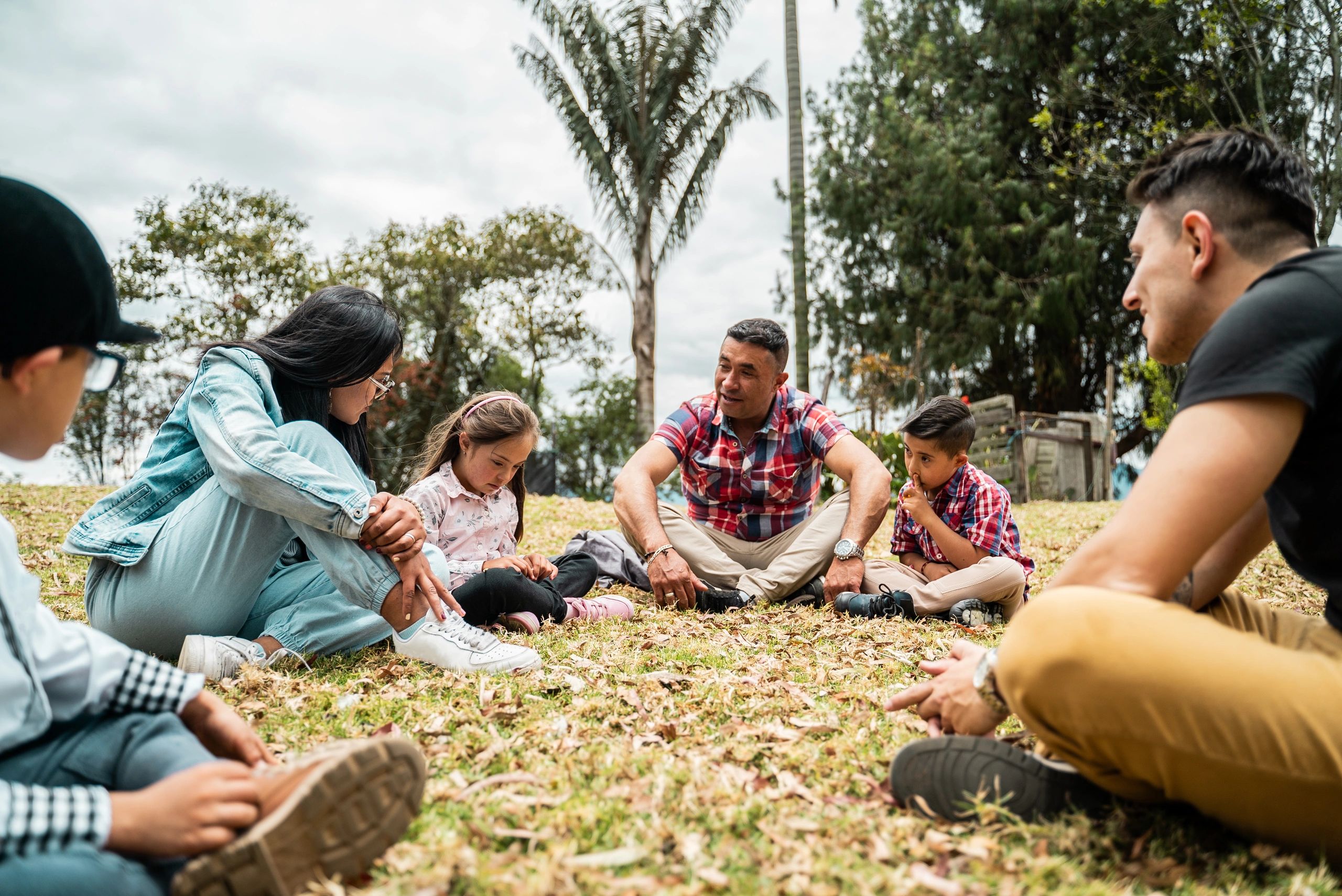 Family talking together in a supportive setting