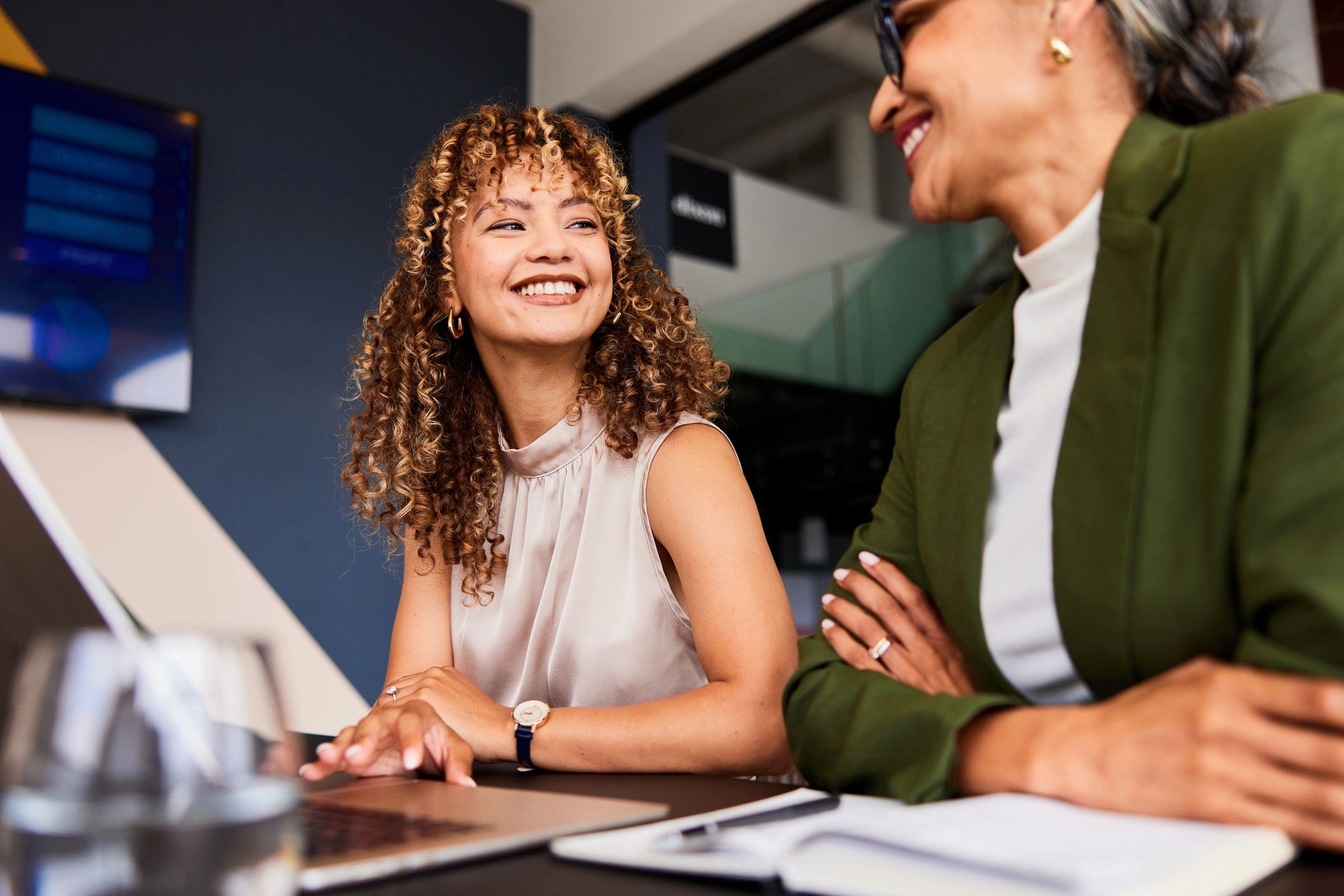 Two professionals meeting for career coaching